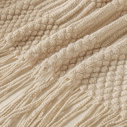 Close-up of textured beige fabric with a ribbed pattern