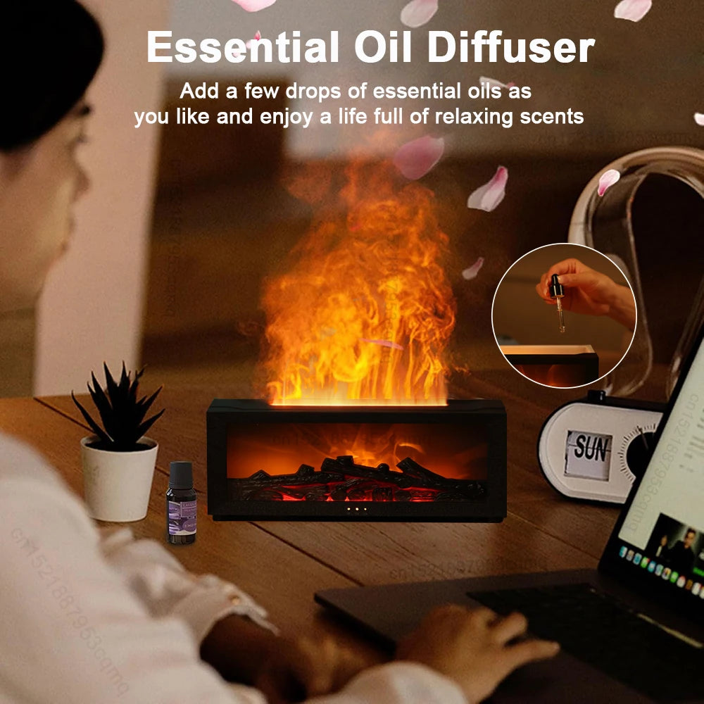 Essential oil diffuser with a cozy indoor setting, including a fire pit and person using a laptop.